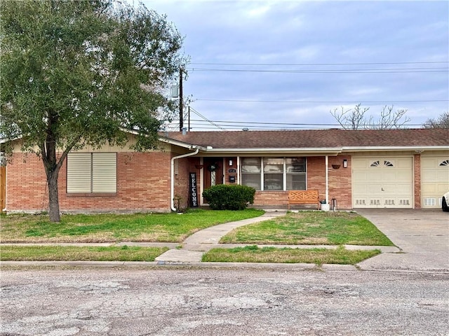 ranch-style home with a garage and a front lawn