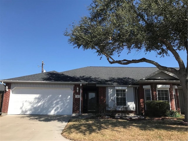 single story home with a garage and a front yard