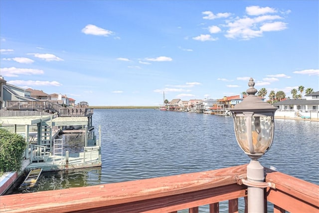 dock area with a water view