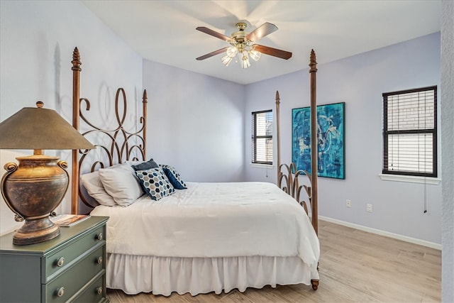 bedroom featuring ceiling fan and light hardwood / wood-style flooring