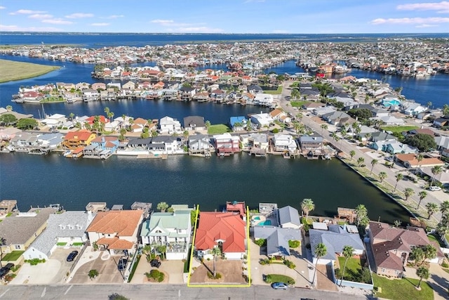 birds eye view of property featuring a water view