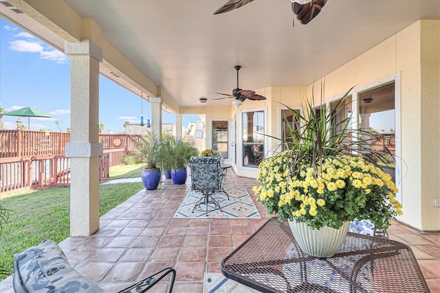 view of patio with ceiling fan