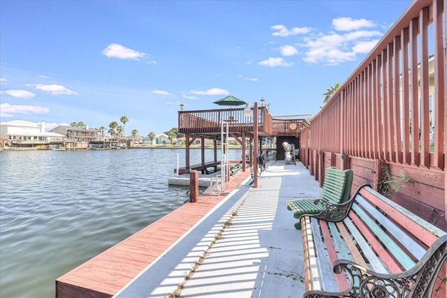 dock area featuring a water view