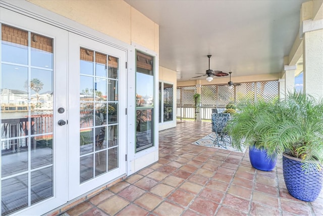 view of patio / terrace with ceiling fan and french doors