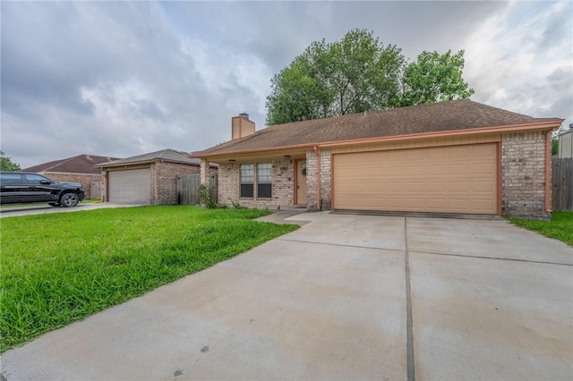 ranch-style house featuring brick siding, a garage, driveway, and a chimney