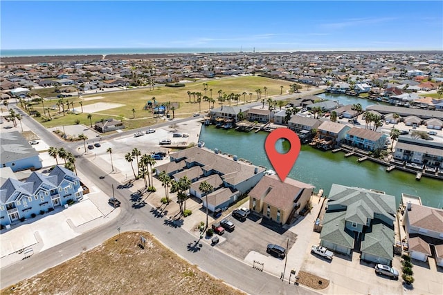 aerial view featuring a residential view and a water view