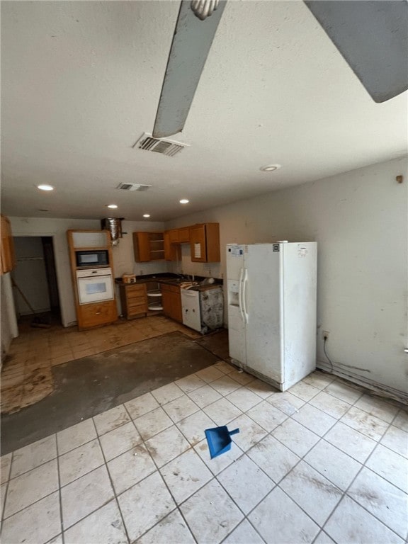 kitchen featuring white appliances