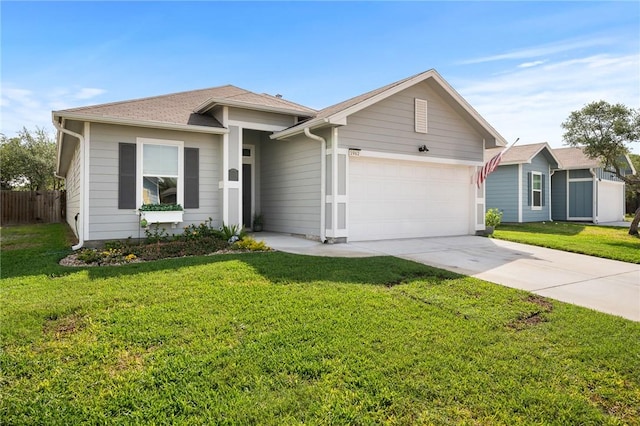 1962 Lighthouse Lakes Ln, Aransas Pass, TX 78336 - single story home with a front lawn, driveway, fence, an attached garage, and a shingled roof