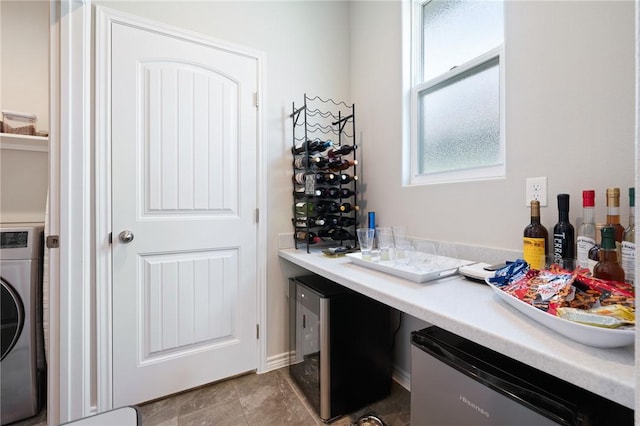 1962 Lighthouse Lakes Ln, Aransas Pass, TX 78336 - bar with washer / dryer, dishwashing machine, and a bar