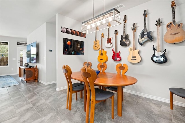 1962 Lighthouse Lakes Ln, Aransas Pass, TX 78336 - dining area featuring baseboards
