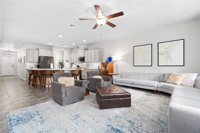 1962 Lighthouse Lakes Ln, Aransas Pass, TX 78336 - living room featuring a ceiling fan, visible vents, and recessed lighting