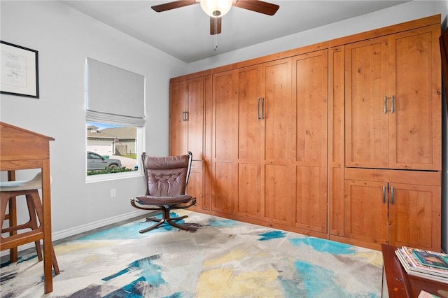 1962 Lighthouse Lakes Ln, Aransas Pass, TX 78336 - living area featuring carpet floors, a ceiling fan, and baseboards