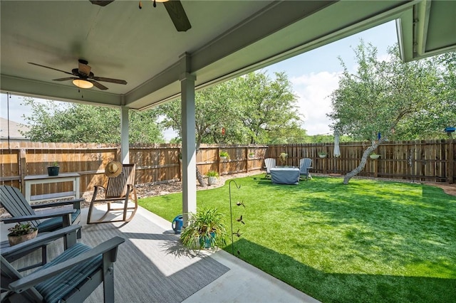 1962 Lighthouse Lakes Ln, Aransas Pass, TX 78336 - view of yard with a fenced backyard, a patio area, and ceiling fan