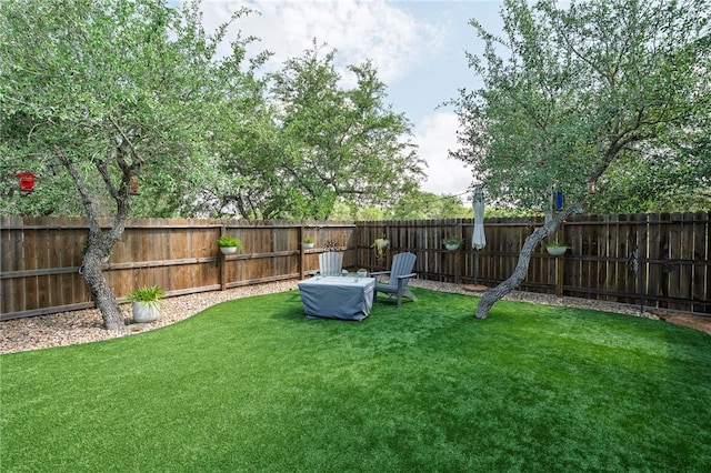 1962 Lighthouse Lakes Ln, Aransas Pass, TX 78336 - view of yard featuring a fenced backyard