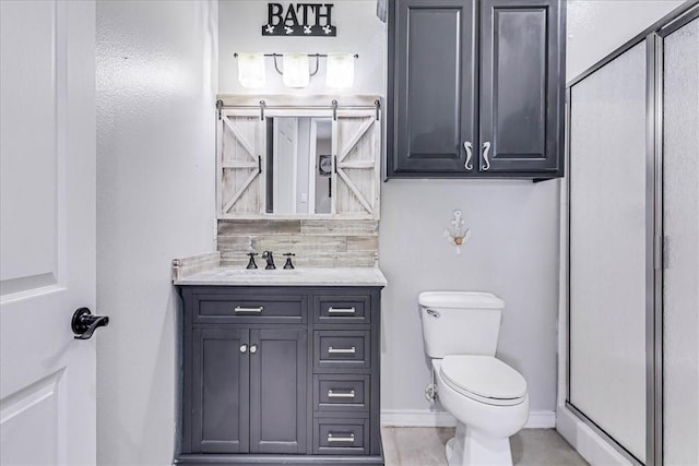 bathroom with walk in shower, vanity, and toilet