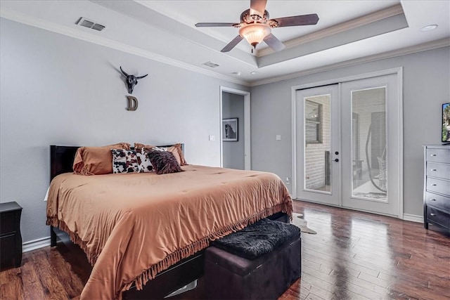 bedroom with french doors, a raised ceiling, access to exterior, ceiling fan, and ornamental molding