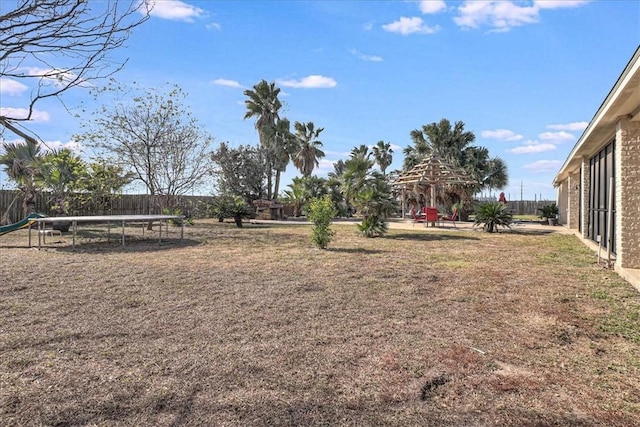 view of yard featuring a trampoline