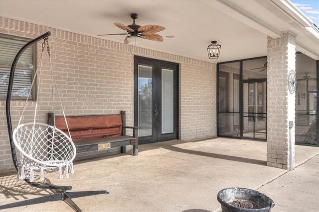 view of patio featuring french doors and ceiling fan