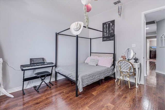 bedroom featuring dark wood-type flooring