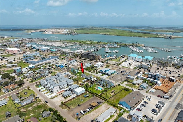 bird's eye view with a water view