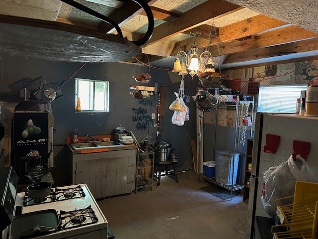 interior space featuring sink and an inviting chandelier