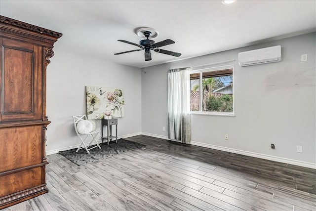 434 Cape Lookout Dr, Corpus Christi, TX 78412 - unfurnished office with baseboards, a wall mounted AC, wood finished floors, and a ceiling fan