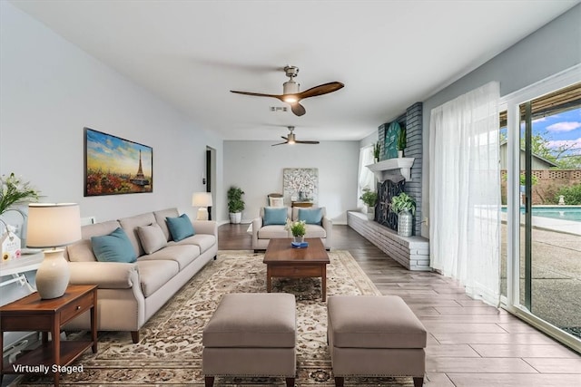 434 Cape Lookout Dr, Corpus Christi, TX 78412 - living room with baseboards, wood finished floors, and a ceiling fan