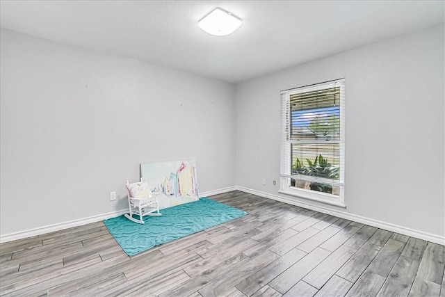 434 Cape Lookout Dr, Corpus Christi, TX 78412 - unfurnished room with baseboards and wood finished floors