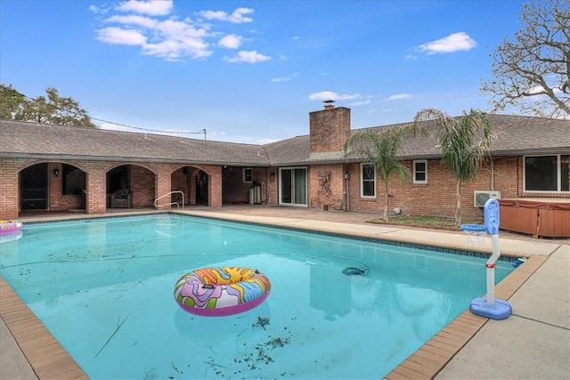 434 Cape Lookout Dr, Corpus Christi, TX 78412 - outdoor pool with a hot tub and a patio area