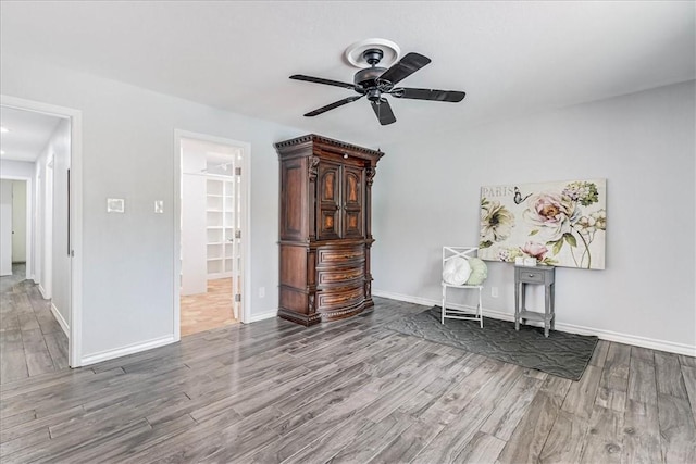 434 Cape Lookout Dr, Corpus Christi, TX 78412 - interior space featuring baseboards, wood finished floors, and a ceiling fan