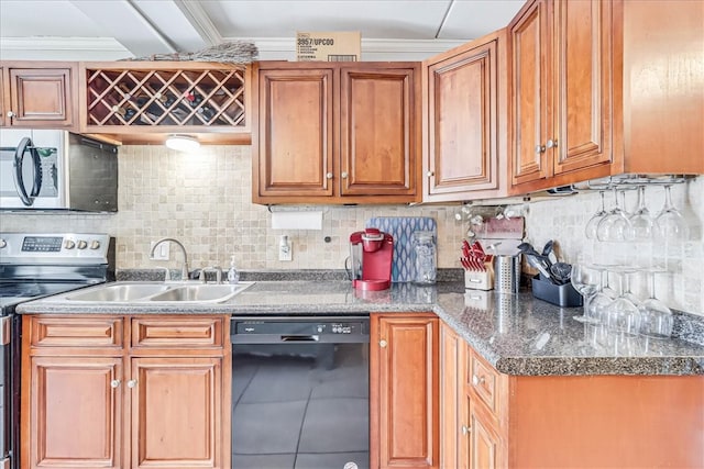 kitchen with appliances with stainless steel finishes, tasteful backsplash, ornamental molding, and sink