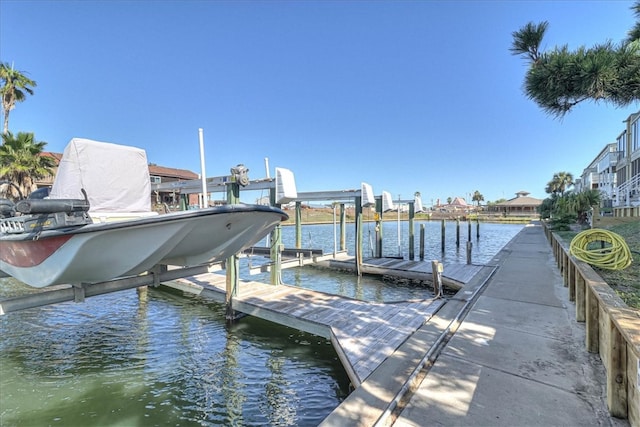 view of dock with a water view