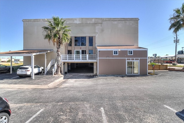 exterior space with a carport