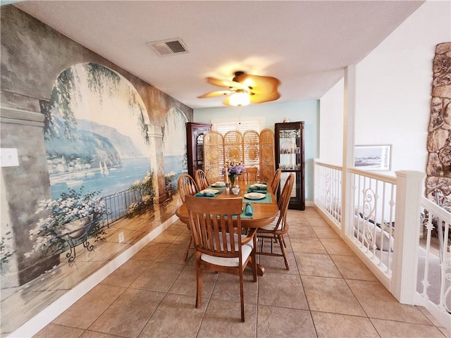 13757 Cayo Gorda Ct, Corpus Christi, TX 78418 - dining room with light tile patterned flooring, arched walkways, and a ceiling fan