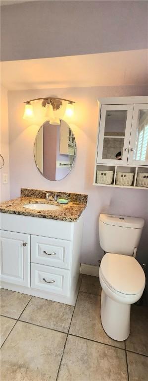 13757 Cayo Gorda Ct, Corpus Christi, TX 78418 - bathroom with tile patterned floors and vanity
