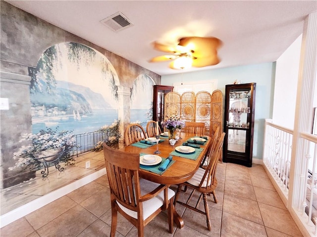 13757 Cayo Gorda Ct, Corpus Christi, TX 78418 - dining room featuring light tile patterned flooring, arched walkways, and ceiling fan