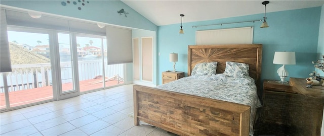 13757 Cayo Gorda Ct, Corpus Christi, TX 78418 - tiled bedroom featuring access to outside and vaulted ceiling
