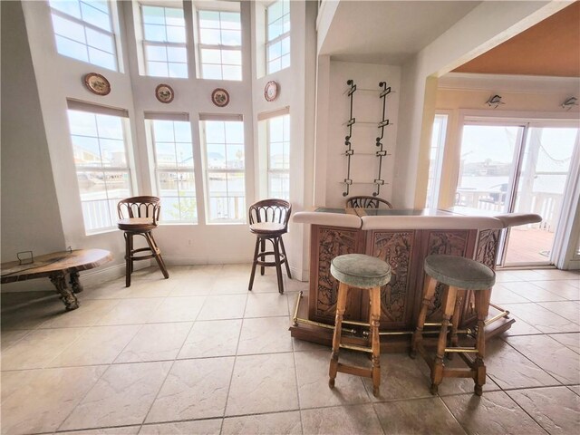 13757 Cayo Gorda Ct, Corpus Christi, TX 78418 - dining room with a dry bar and baseboards