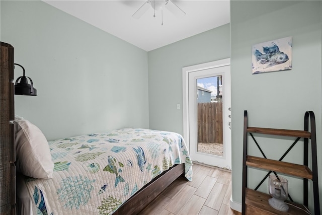 bedroom with light hardwood / wood-style flooring and ceiling fan