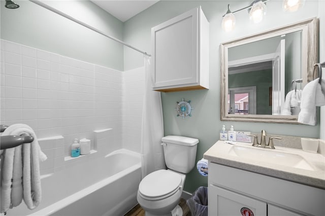 full bathroom featuring vanity, toilet, and shower / tub combo with curtain