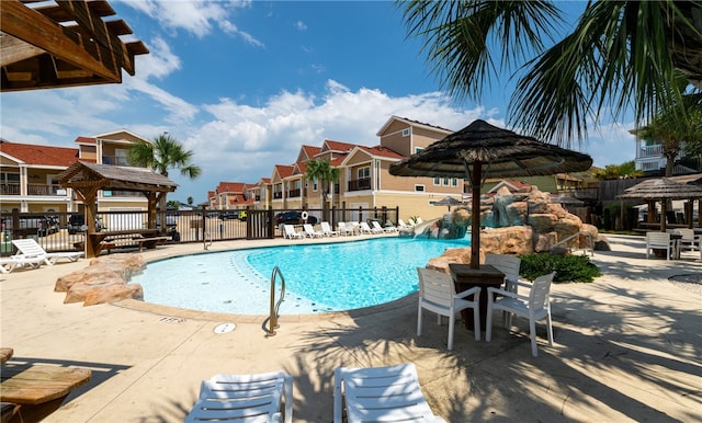 view of swimming pool featuring a gazebo and a patio area