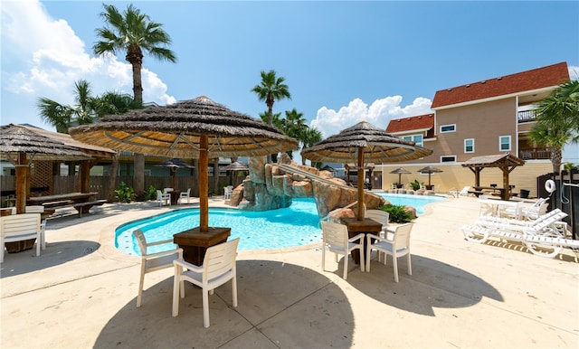 view of swimming pool featuring a gazebo and a patio area