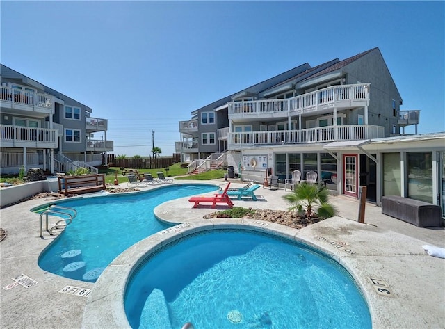 pool with a patio