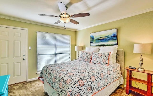 bedroom with baseboards, carpet floors, a ceiling fan, and crown molding