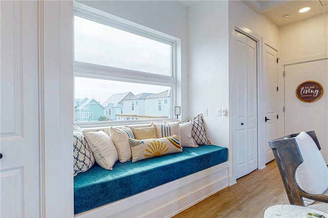 sitting room with light hardwood / wood-style flooring