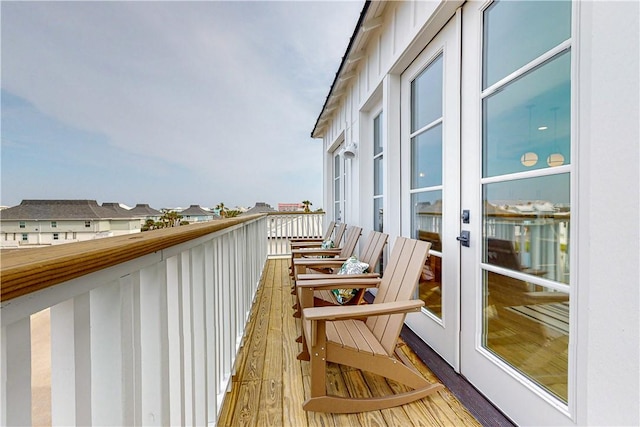 balcony featuring french doors