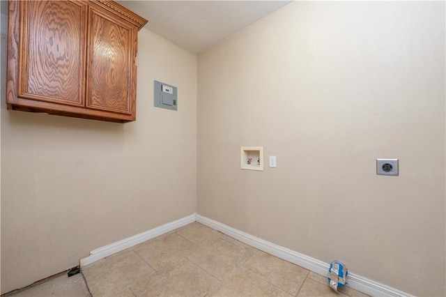 laundry area featuring washer hookup, light tile patterned flooring, cabinets, and hookup for an electric dryer