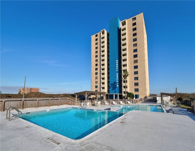 view of swimming pool with a patio area