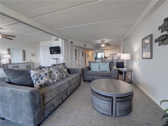 living room featuring ceiling fan