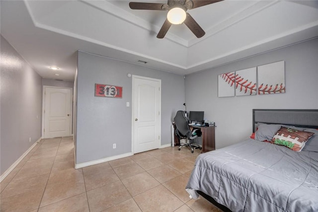 4465 S Oak Cir, Robstown, TX 78380 - bedroom featuring a raised ceiling, light tile patterned floors, an office area, and a ceiling fan
